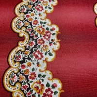 Farbenprächtiger Patchworkstoff mit Bordüren