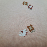 Baumwolljersey beige mit Täubchen und Blümchen