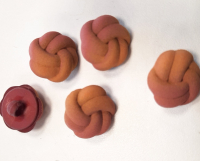 Modeknopf Knoten ocker/altrose